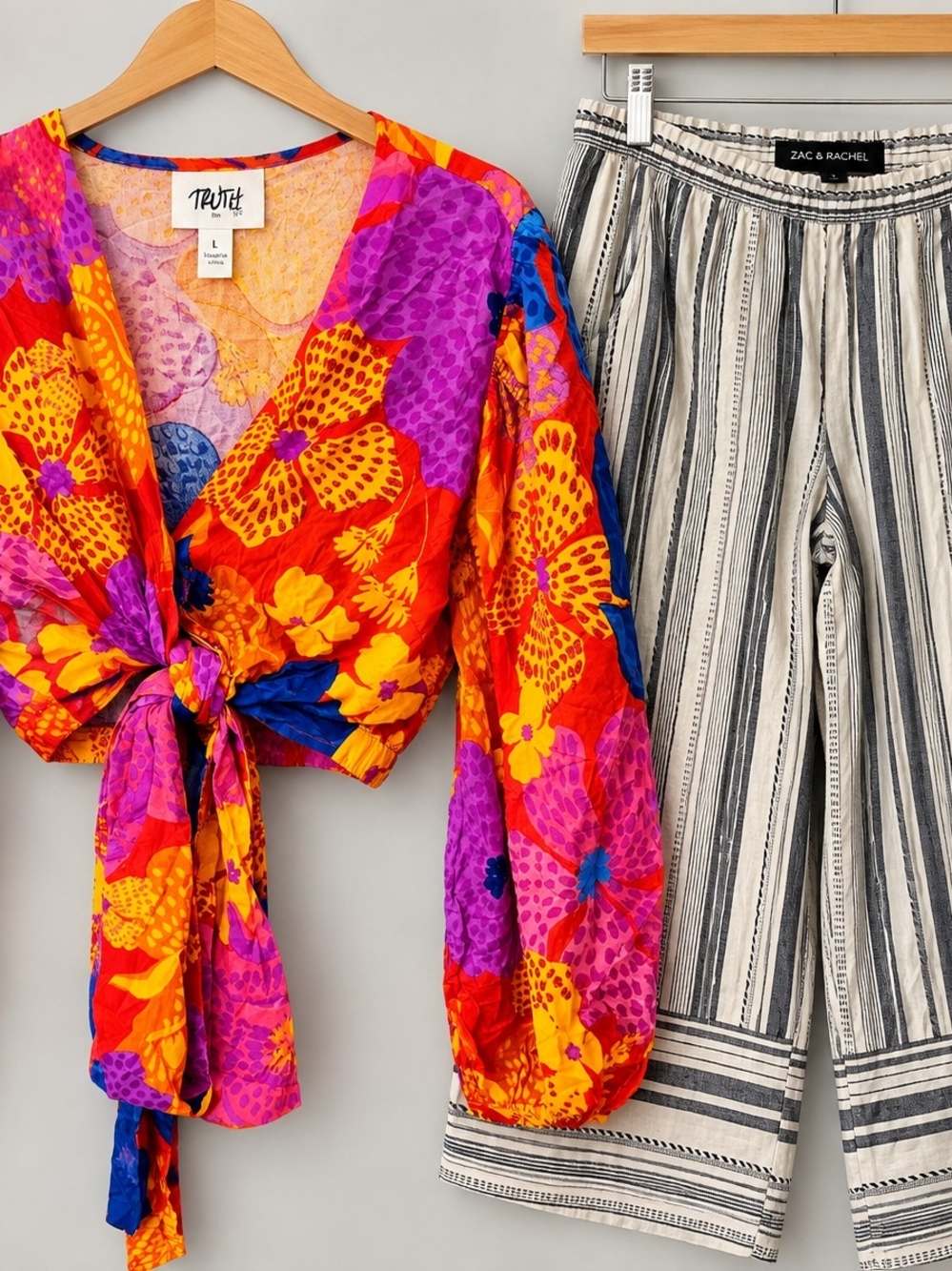 2-piece women’s size Large clothing bundle, both new with tags.